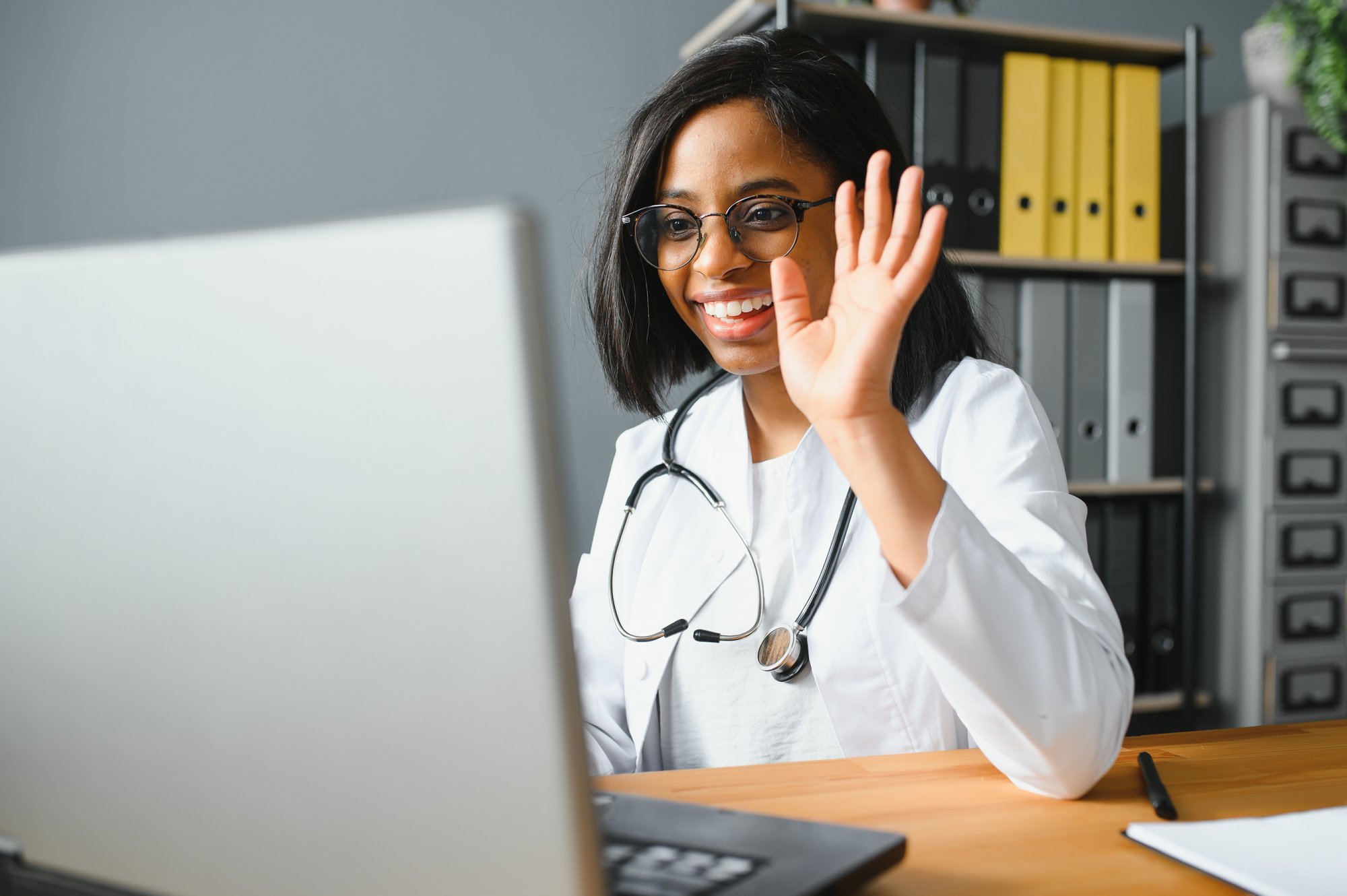 african-female-doctor-make-online-telemedicine-video-call-consult-patient-afro-american-black-woman-therapist-talking-camera-remote-videoconference-chat-webcam-view-face-headshot