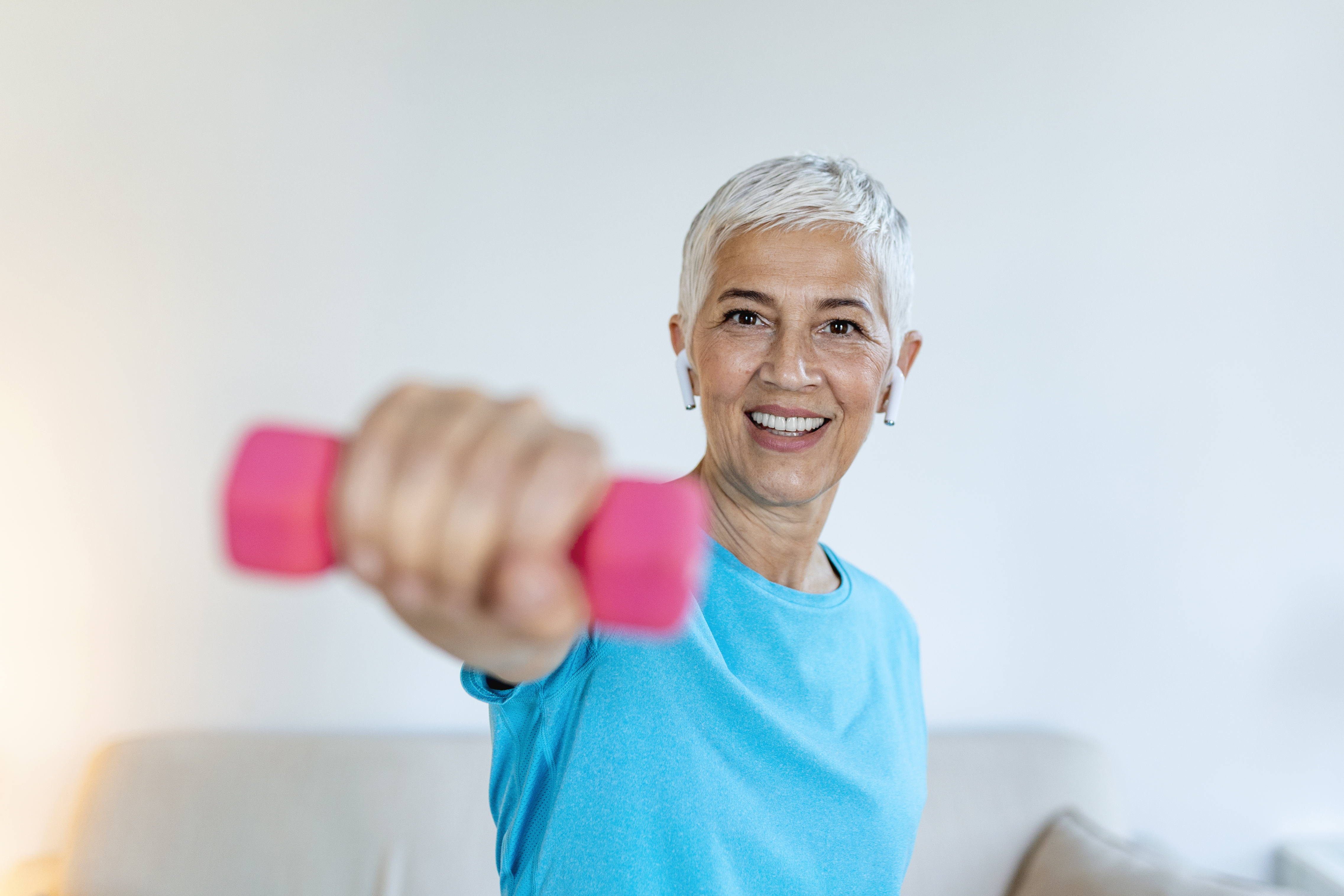 senior-woman-exercise-with-dumbbells-home-elderly-woman-prefers-healthy-lifestyle